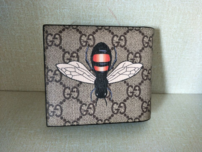 G*u*i with plaid bee wallet